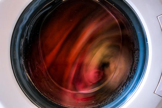 washing machine with dirty clothes inside
