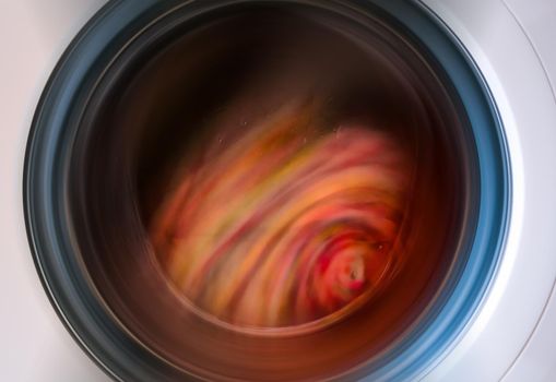 washing machine with dirty clothes inside