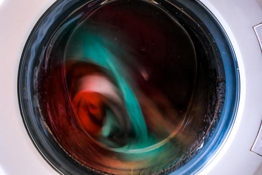washing machine with dirty clothes inside