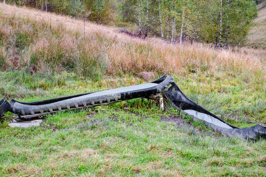 Water for livestock in the pastures, made of rubber truck
