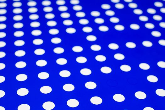 white dots on a blue background