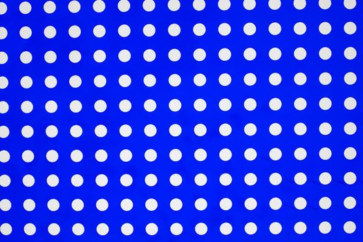white dots on a blue background