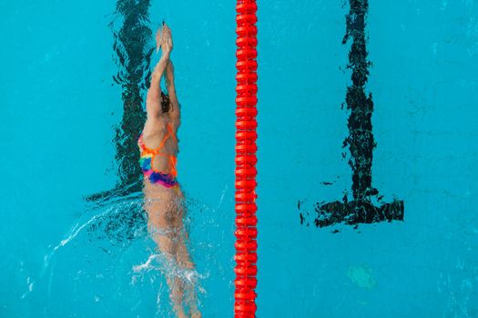 competitive swimming in the pool during training.