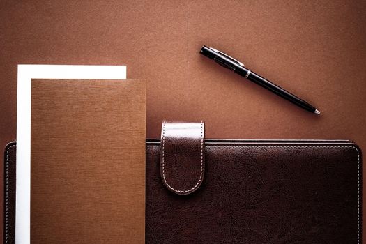 Productivity, work and corporate lifestyle concept - Vintage business briefcase on the office table desk, flatlay background