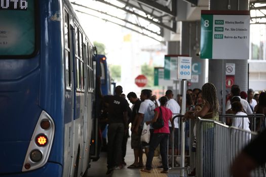 salvador, bahia / brazil - september 8, 2017: Passengers are seen while boarding buses at Mussurunga Station in Salvador.