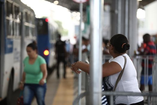 salvador, bahia / brazil - september 8, 2017: Passengers are seen while boarding buses at Mussurunga Station in Salvador.