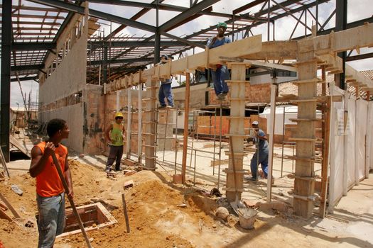 porto seguro, bahia / brazil - november 10, 2010: civil construction workers are seen working on renovating the airport in the city of Porto Seguro, in southern Bahia.