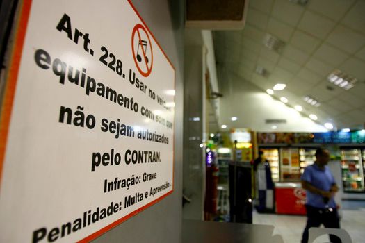 salvador, bahia / brazil - october 10, 2014: sign at gas station informs about automotive sound prohibition in the city of Salvador.