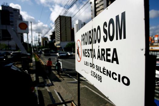 salvador, bahia / brazil - october 10, 2014: sign at gas station informs about automotive sound prohibition in the city of Salvador.