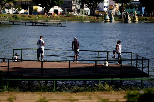 salvador, bahia / brazil - june 28, 2018: people are seen during fishing in the Dique de itororo in the city of Salvador.





