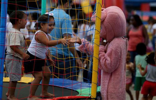 salvador, bahia / brazil - october 8, 2018: Children from public day care centers of the state of Bahia are seen during an event at the Fonte Nova Arena in the city of Salvador.


