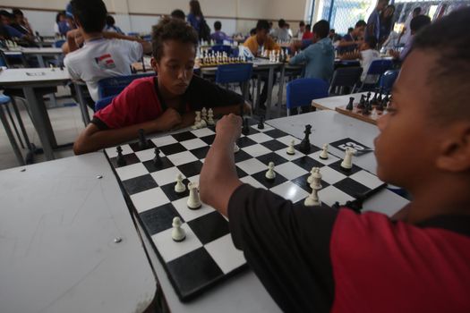 salvador, bahia / brazil - november 8, 2018: Public school students in the Paz neighborhood of Salvador are seen playing chess.