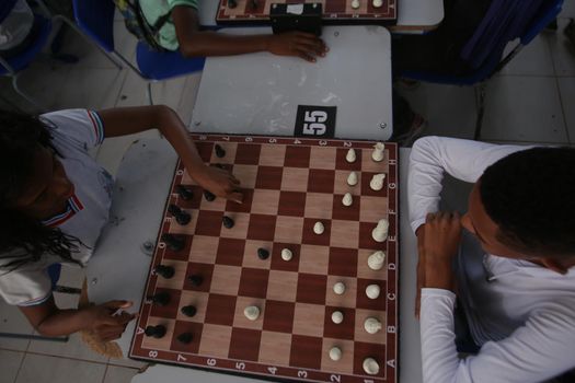 salvador, bahia / brazil - november 8, 2018: Public school students in the Paz neighborhood of Salvador are seen playing chess.