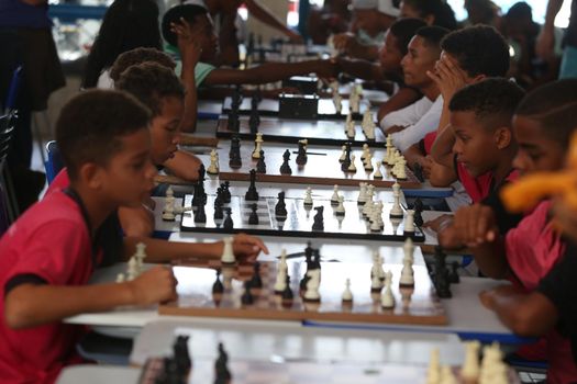 salvador, bahia / brazil - november 8, 2018: Public school students in the Paz neighborhood of Salvador are seen playing chess.