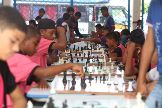 salvador, bahia / brazil - november 8, 2018: Public school students in the Paz neighborhood of Salvador are seen playing chess.