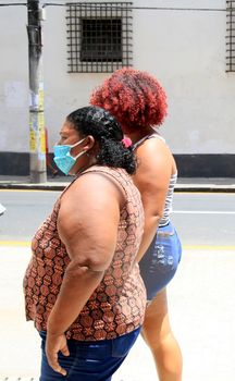 salvador, bahia, brazil - december 14, 2020: fat woman is seen in the city of Salvador.