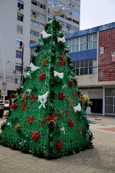 salvador, bahia, brazil - december 14, 2020: Christmas tree made from recycling of pet bottle is seen in the Barra district in the city of Salvador.