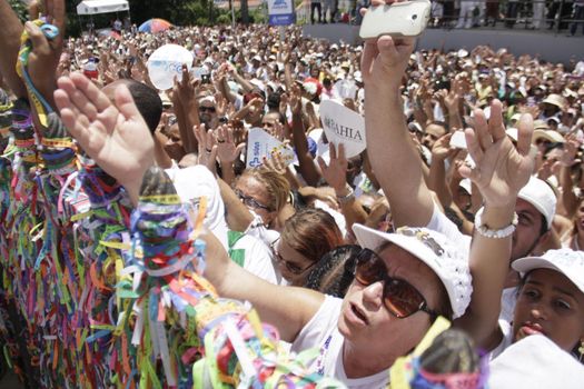 salvador, bahia / brazil - january 15, 2015: Candomble fans and devotees of Senhor do Bonfim accompany the traditional washing of the stairs of the Bonfim Church in Salvador.