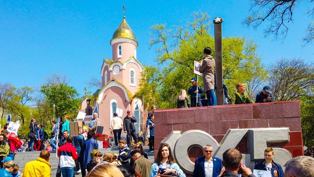 Vladivostok, Primorsky Krai - may 9, 2019: Ship quay, a lot of people celebrate the Victory Day.