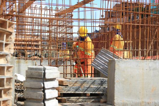 salvador, bahia / brazil - march 23, 2017: Workers seen at construction work of the bus terminal in the city Salvador.