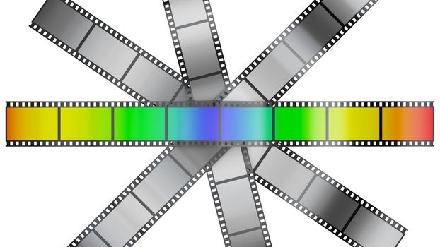 film with color pictures on the background uncolored film
