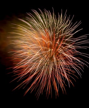 Colorful fireworks isolated on black sky background.