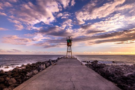 jetty and lighthouse in Saint Pierre, La Reunion island, Indian Ocean, april 26, 2016,  Saint Pierre, France