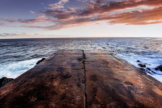 jetty and lighthouse in Saint Pierre, La Reunion island, Indian Ocean, april 26, 2016,  Saint Pierre, France