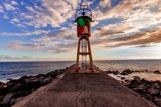 jetty and lighthouse in Saint Pierre, La Reunion island, Indian Ocean, april 26, 2016,  Saint Pierre, France