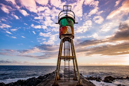 jetty and lighthouse in Saint Pierre, La Reunion island, Indian Ocean, april 26, 2016,  Saint Pierre, France