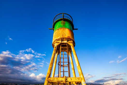 jetty and lighthouse in Saint Pierre, La Reunion island, Indian Ocean, april 26, 2016,  Saint Pierre, France