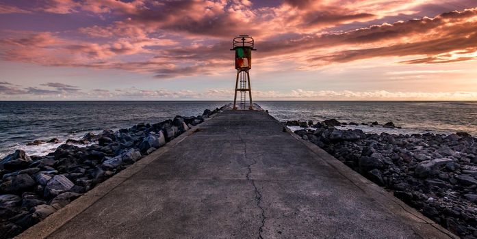 jetty and lighthouse in Saint Pierre, La Reunion island, Indian Ocean, april 26, 2016,  Saint Pierre, France