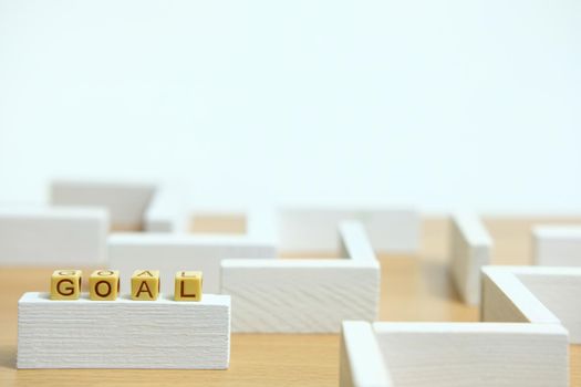 Business strategy conceptual photo – wooden beads word Plan above labyrinth maze. Image photo