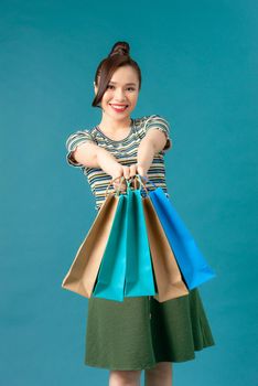 Woman with colored shopping bag