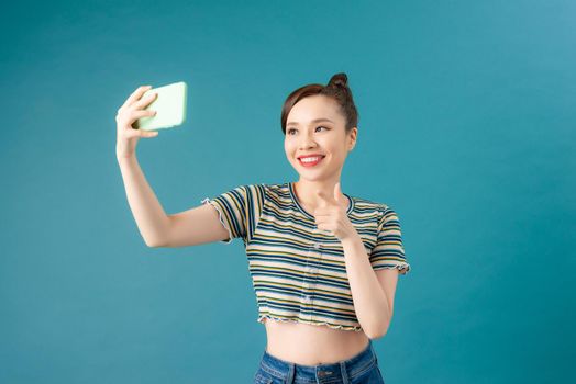 a beautiful girl taking selfie