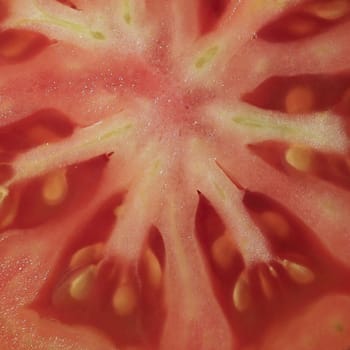 macro view of a sliced tomato vegetable