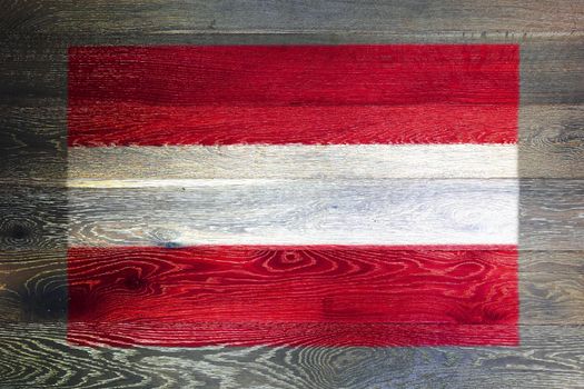 An Austria flag on rustic old wood surface background