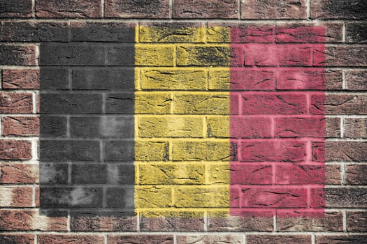 A Belgium flag on a brick wall background