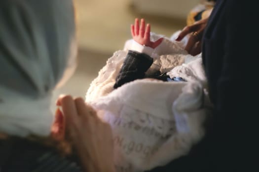 A close up of a newborn baby little hand