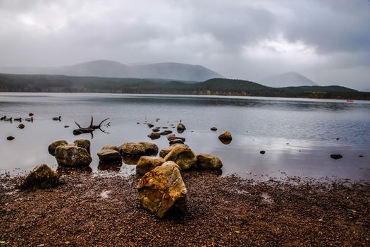 The beautiful Loch Morlich in Scotland, Cairngorm Mountains, United Kingdom