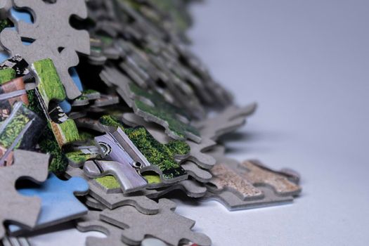 multicoloured puzzles on a white background. isolated. Top view, copy space. . High quality photo