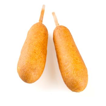 Two plain corn dogs isolated on white.