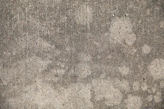 Sidewalk concrete  texture with spots and chips