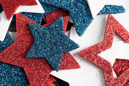 Close up of glitter red white and blue patriotic stars.