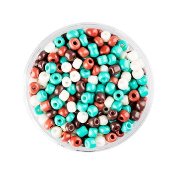 Small container of glass seed beads isolated on white background overhead view.