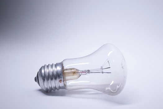 light bulb on a white background. Copy space. Isolated. High quality photo