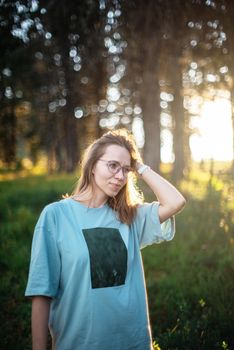 Healthy lifestyle woman walking in mountains in summer forest area