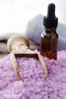 Lavender bath crystals and a dropper bottle of lavender oil