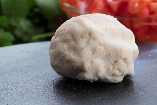 Dough balls made from harina masa flour for making corn tortillas.