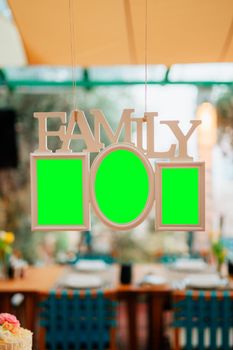 White frame for several photos. Green background